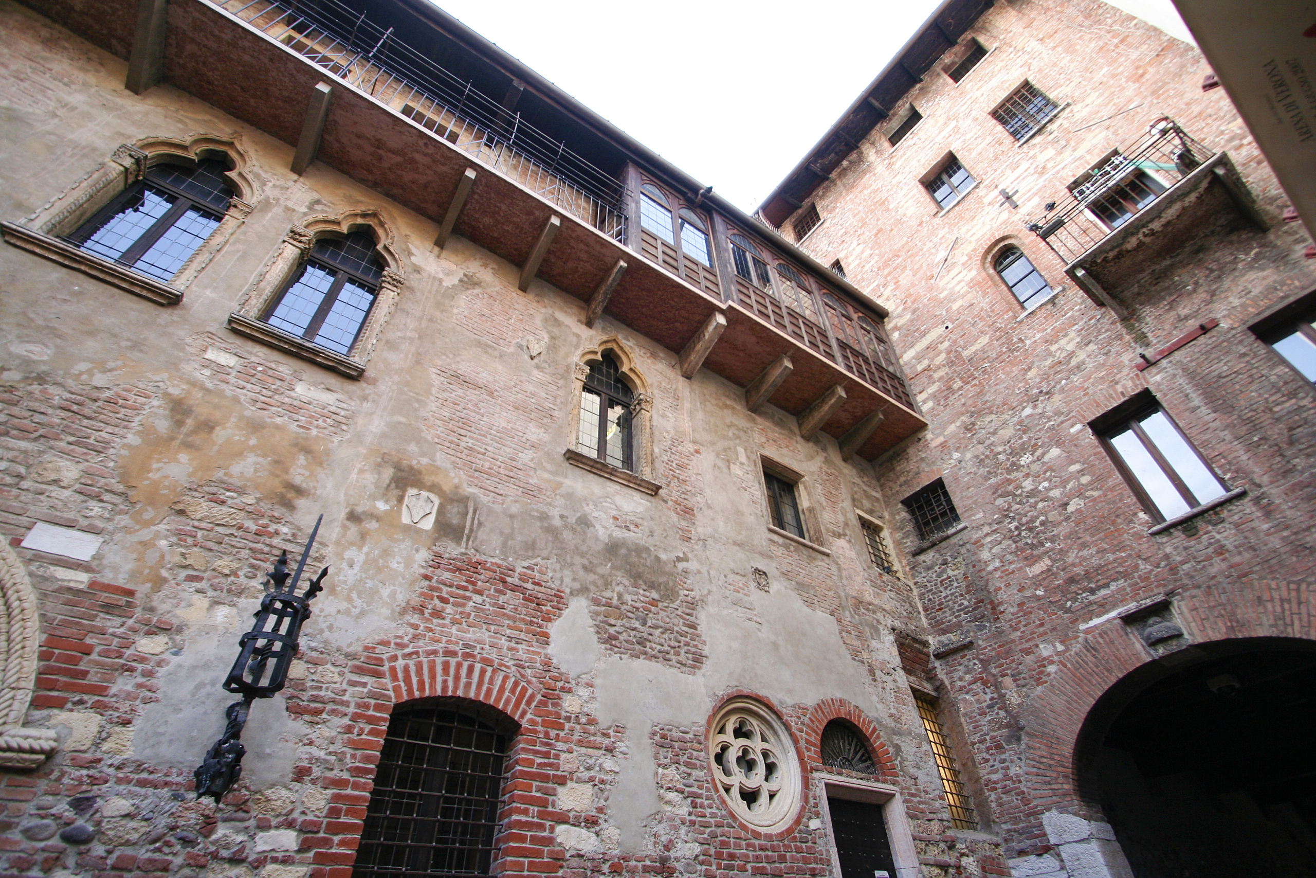 Historic windows and brickwork in the courtyard of Juliet’s House